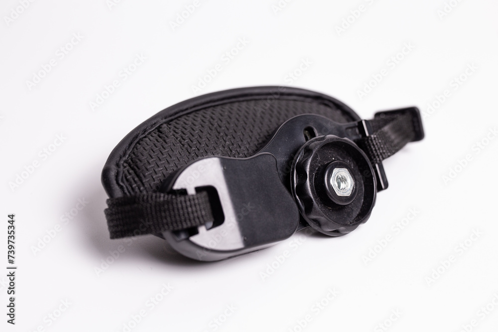 Obraz premium Black camera hand strap made of genuine leather with a metal carabiner for attaching to the camera