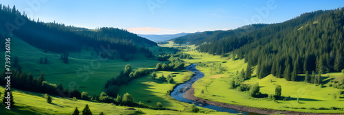 Serene Valley: A Lush Landscape of Green Meadows, Sparkling River, and Majestic Mountains Under a Blue Sky