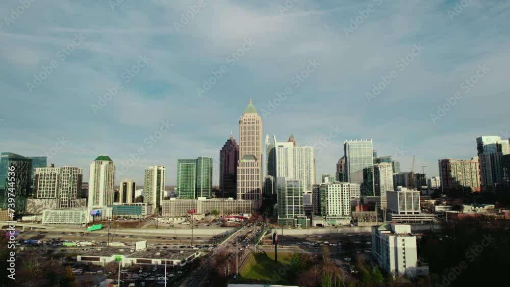 North Atlanta, Georgia, USA, showcasing the vibrant city skyline adorned with towering skyscrapers, set against a backdrop of highway.