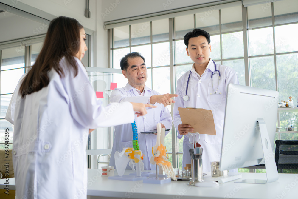 A medical professor is lecturing on a case study related to disease treatment to medical students A medical professor is lecturing on a case study related to disease treatment to medical students
