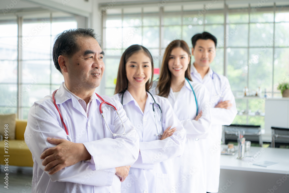 Portrait of medical professor and a medical student in a hospital Portrait of medical professor and a medical student in a hospital