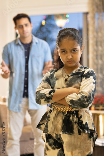 Canvas Print Angry father scolding his daughter at home
