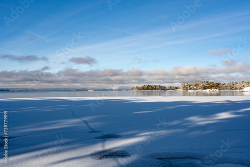 Beautiful view over ice and water on lake © Jonas