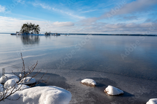 Beautiful view over ice and water on lake