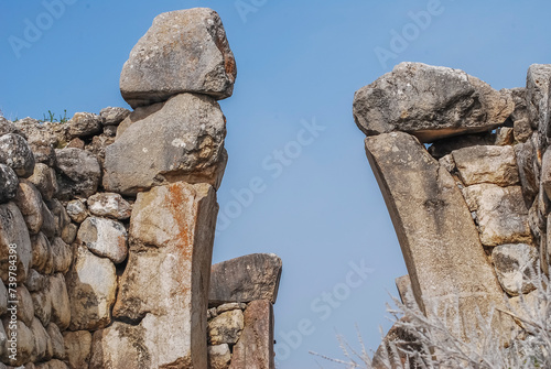 Hattusha the capital of the Hittites and its wall reliefs entrance gates nature and ruins on a sunny day photo