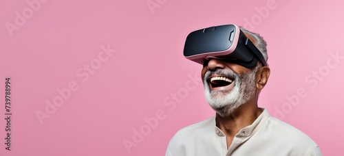  61-year-old Hispanic man smiling as she experiences virtual reality with wireless VR goggles against a soft pastel backdrop with ample copy space, her eyes reflecting the wonder of the virtual world.