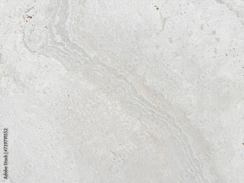 Abstract design of grey and white marbling on concrete, offering a versatile texture for various creative projects..
