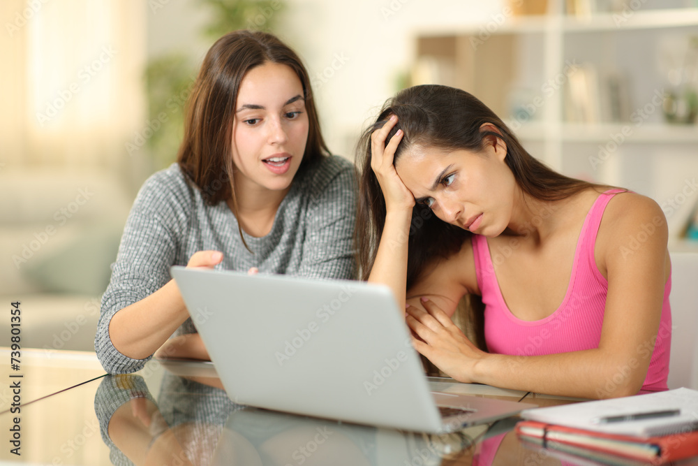 Private teacher teaching to a bad frustrated student at home Private teacher teaching to a bad frustrated student at home