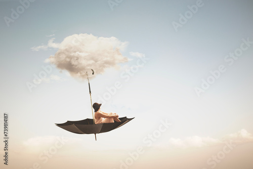 surreal umbrella carried by a cloud takes a woman to the sky, abstract concept