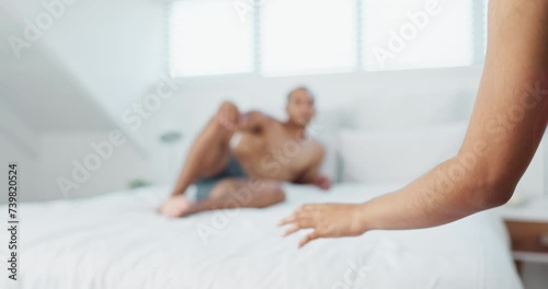 Couple, bed and hand with underwear on duvet for love, romance or intimacy in affection, morning or seduction at home. Closeup of woman, man or lovers lying in bedroom for compassion on anniversary photo