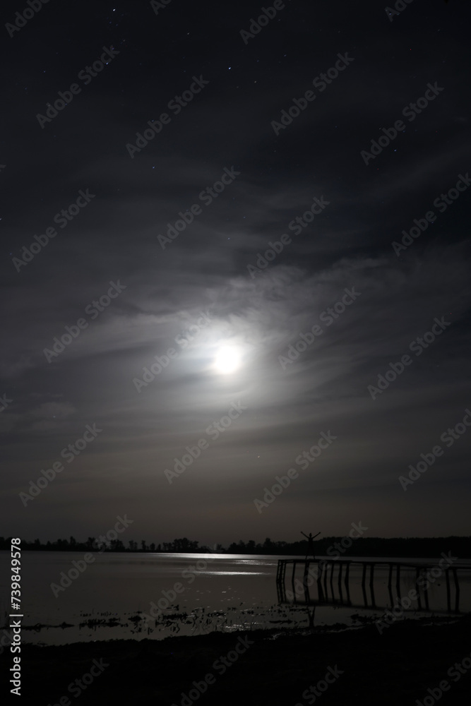 photo night lake. the moon and stars shine on the lake. photo night lake. the moon and stars shine on the lake.