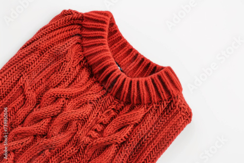 Vibrant Red Knitted Sweater Detail on a Clean White Background