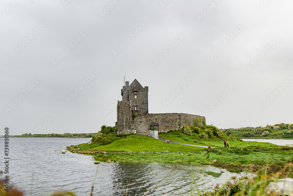 Dunguaire Castle, a 16th-century tower house on the southeastern shore of Galway Bay in County Galway, Ireland, near Kinvara. Dunguaire Castle, a 16th-century tower house on the southeastern shore of Galway Bay in County Galway, Ireland, near Kinvara.