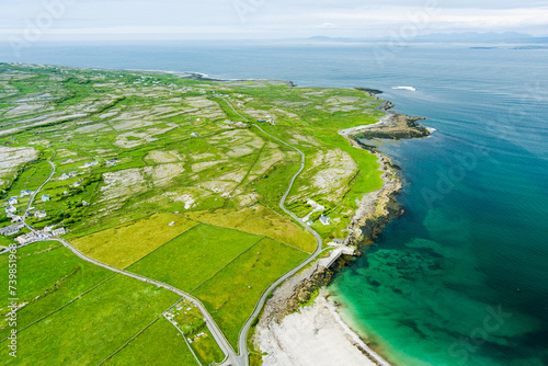 Aerial view of Inishmore or Inis Mor, the largest of the Aran Islands in Galway Bay, Ireland. Famous for its Irish culture, loyalty to the Irish language, and a wealth of ancient sites. photo