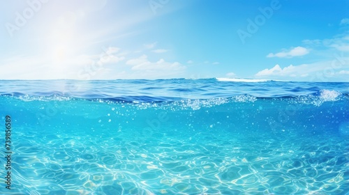 Summer tropical sea with sparkling waves and blue sunny sky