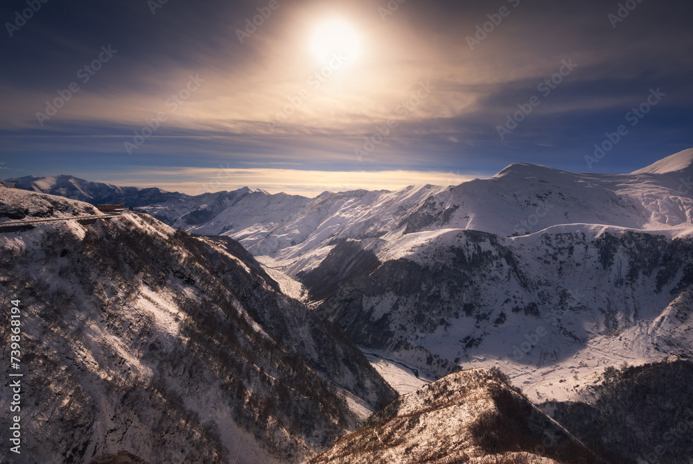 winter sunset over caucasus mountains