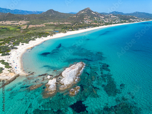 Scoglio di Peppino beach, aerial view, drone, Costa Rei, Muravera, Castiadas. Sardinia. Beach with white sand and crystal clear waters and the famous rock photo