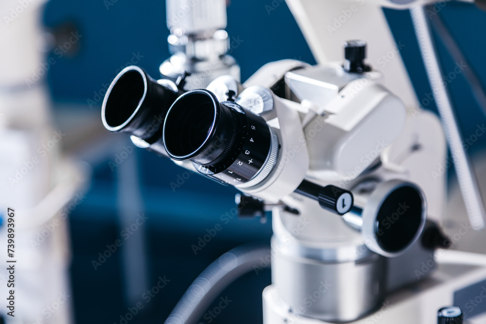 Surgical microscope in the operating room of a modern ophthalmology clinic with high-quality equipment. Vision correction, cataract treatment. Surgical microscope in the operating room of a modern ophthalmology clinic with high-quality equipment. Vision correction, cataract treatment.