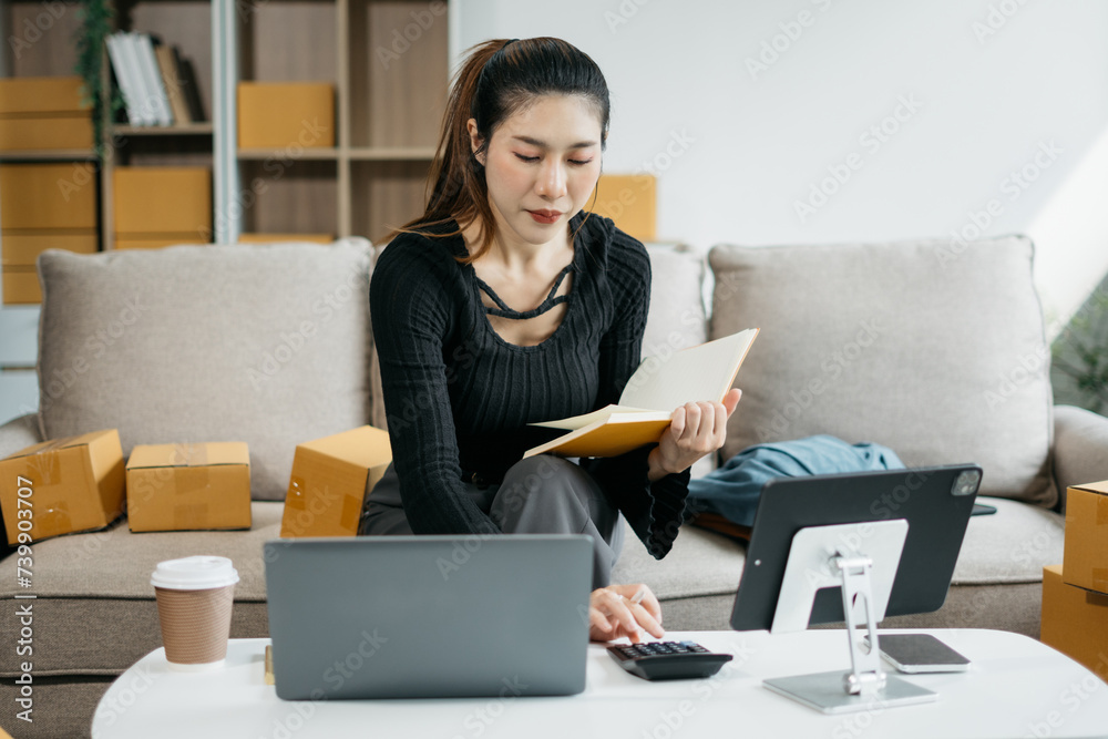 Business woman analyzes business data, busy working on laptop computer and business report on office desk, business strategy analysis concept. Woman start up small business owner. Business woman analyzes business data, busy working on laptop computer and business report on office desk, business strategy analysis concept. Woman start up small business owner.