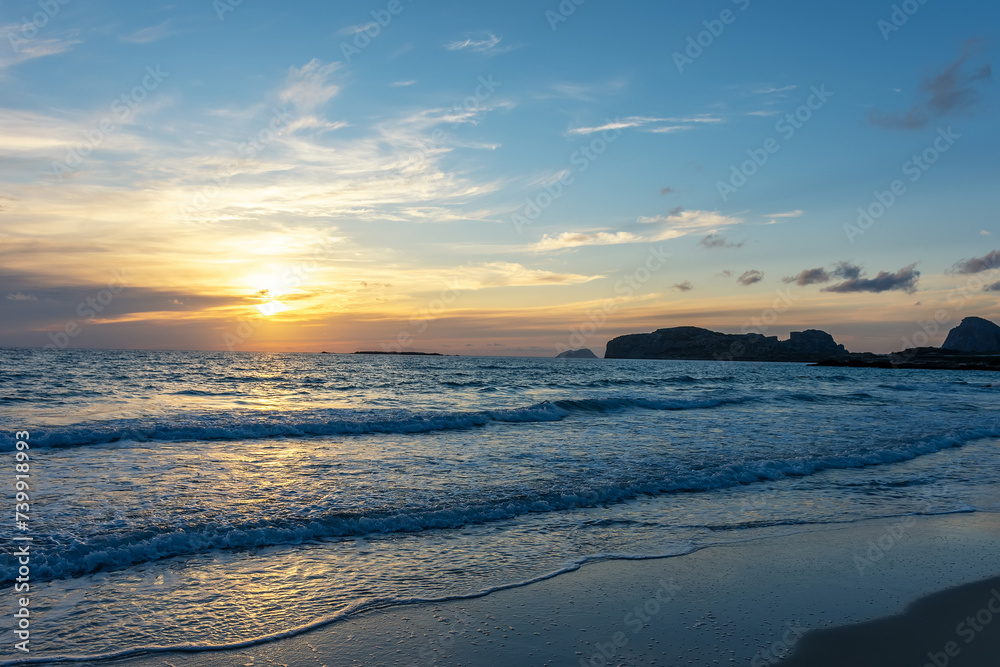 Summer background with tropical beach during sunset. Holiday vacation and travel concept.