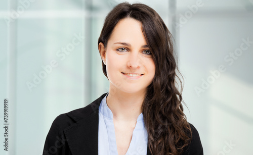 Professional young woman smiling confidently