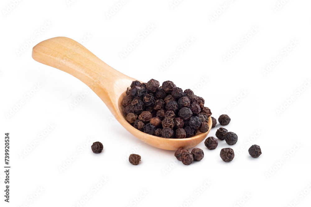 Wooden spoon with black pepper and peppercorns isolated on a white background Wooden spoon with black pepper and peppercorns isolated on a white background