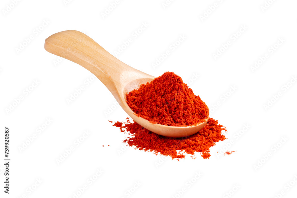 Paprika in a wooden spoon isolated on a white background. Seasoning for cooking Paprika in a wooden spoon isolated on a white background. Seasoning for cooking