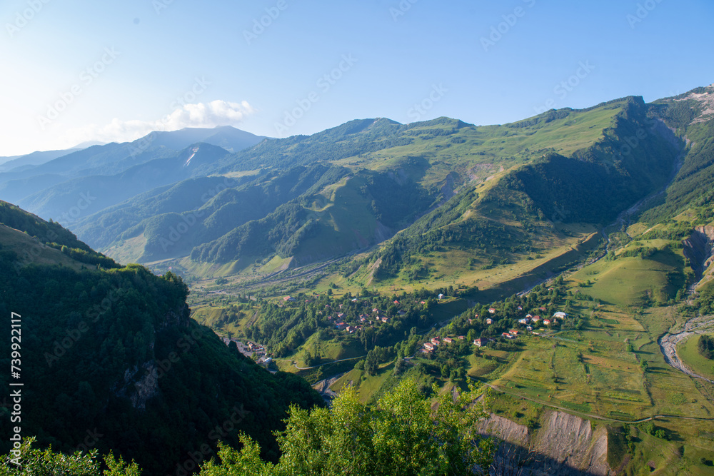 Serenity of the Enchanting Heights: Green Mountains and Blue Skies
