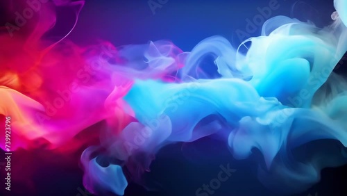 Swirls of colored smoke on a dark background. Vivid purple and blue smoke waves. Concept of creativity, abstract design, fluidity, color dynamics, and visual effects. photo