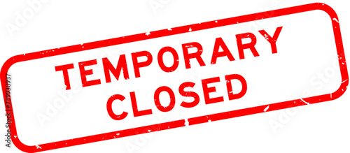 Grunge red temporary closed word square rubber seal stamp on white background