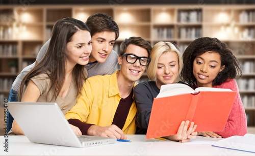 Team of students study in college library