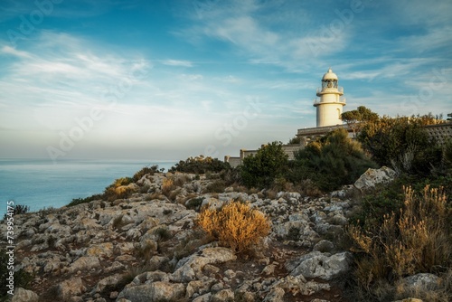 view of the Cap de Sant Antoni Lighthouse in Alicante Province in warm evening light
