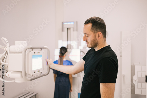 Patient undergoing a radiographic examination photo