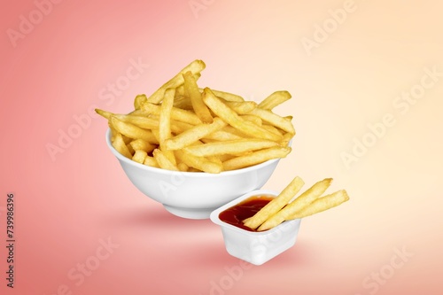 Plate of tasty potato french fries with ketchup