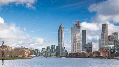 London skyline with white clouds and blue sky