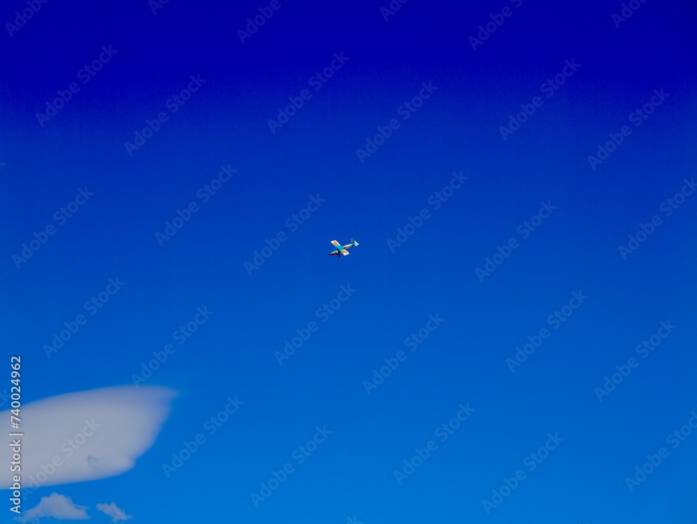 Obraz premium Plane flying near the Aeroclub de Castelló, El Grao de Castellón, Valencia, Spain