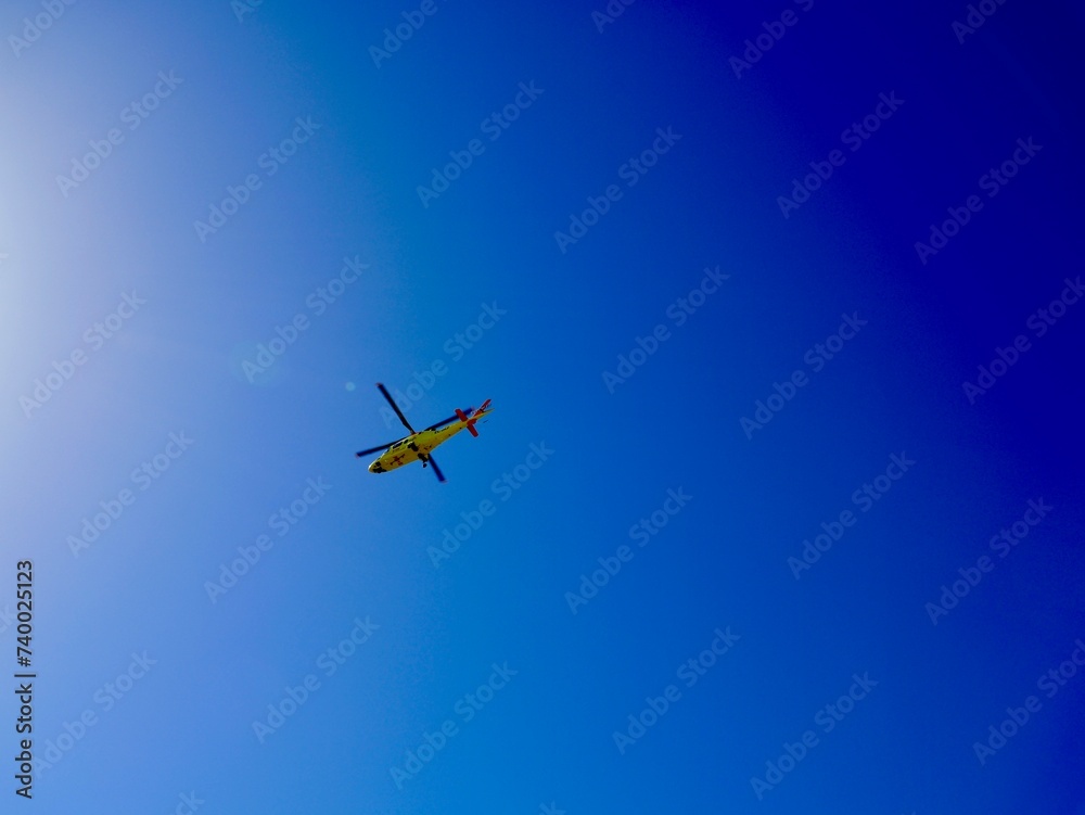 Helicopter fly near the Aeroclub de Castelló, El Grao de Castellón, Valencia, Spain Helicopter fly near the Aeroclub de Castelló, El Grao de Castellón, Valencia, Spain