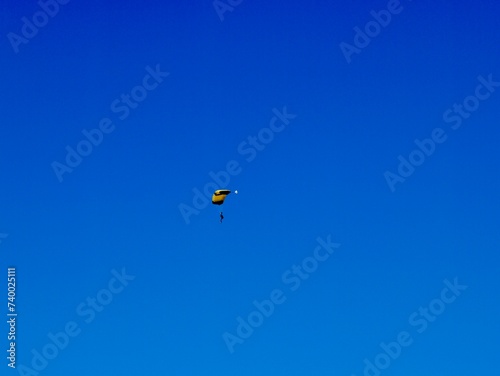 Parachutists flying near the Aeroclub de Castelló, El Grao de Castellón, Valencia, Spain