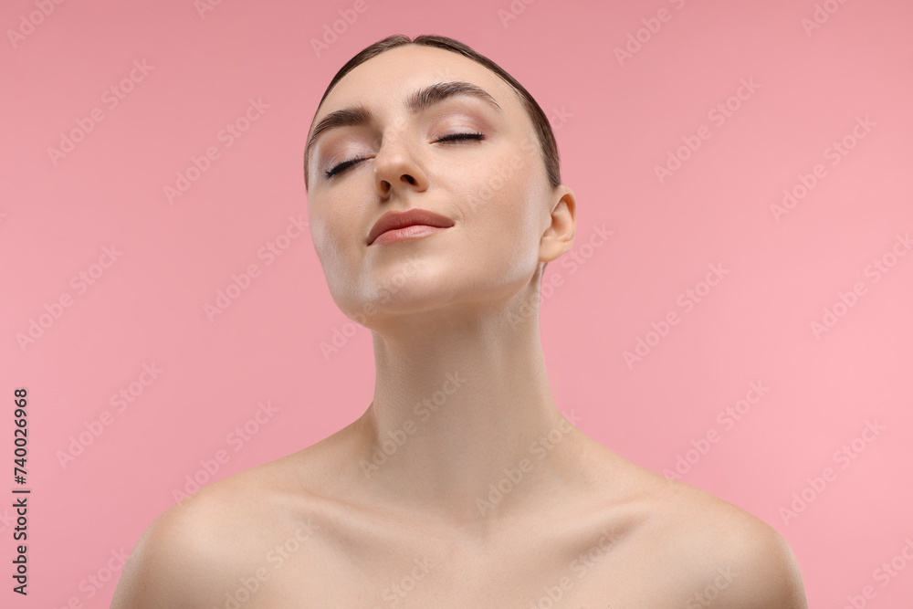 Portrait of beautiful woman on pink background Portrait of beautiful woman on pink background