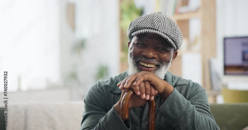 Face, cane and and senior black man with disability on sofa in living room of retirement home to relax. Portrait, funny and elderly person laughing in apartment with wooden walking stick for balance