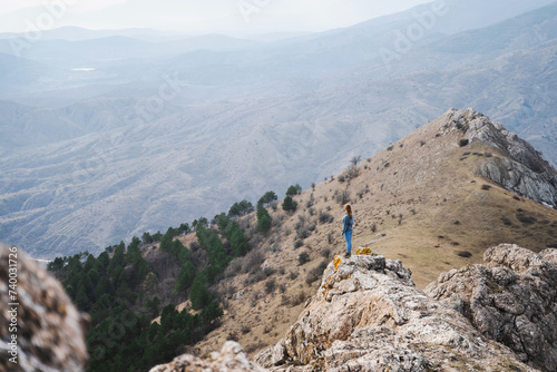 Photography Woman looking at a beautiful view alone, travel healthy lifestyle concept, mount