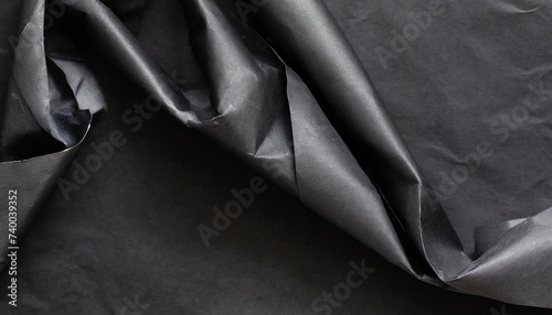 Black ripped wrinkly warp stain sill crumpled paper texture. black fabric textured crumpled paper background. panorama black paper texture background