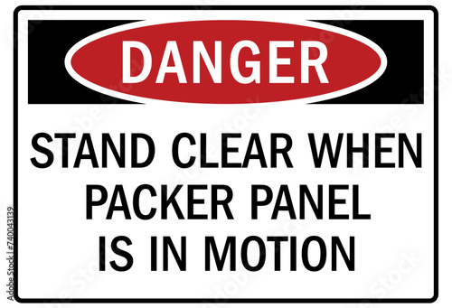 Truck safety sign stand clear when packer panel is in motion