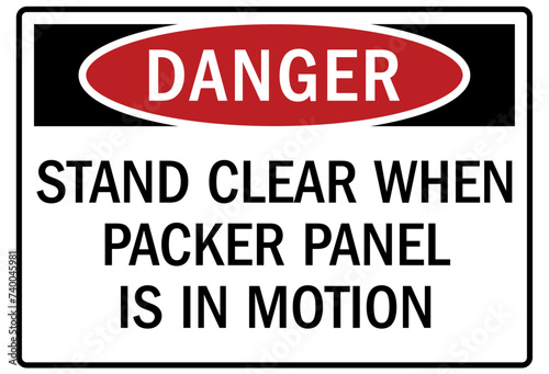 Truck warning sign and labels stay clear when packer panel is in motion