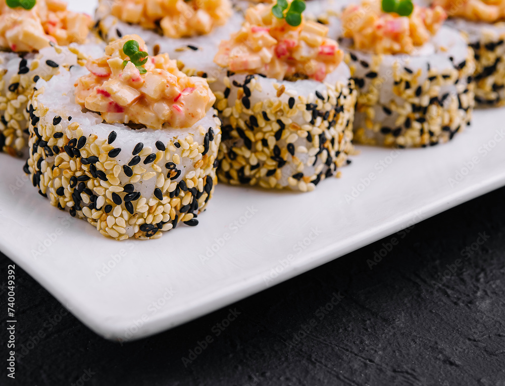 Maki Sushi - Roll on white plate Maki Sushi - Roll on white plate