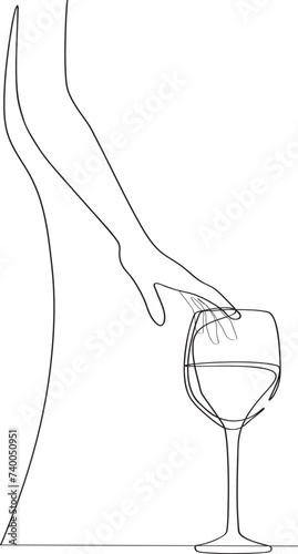 hand touches a glass of wine that stands on the table. one line on a white background