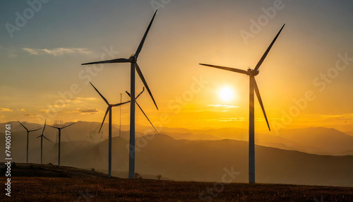 Wind turbine generating electricity and sunset