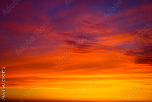 Clouds and different color tones in the sky at sunset. Dance of colors in the sky. Amazing and incredible sunset.