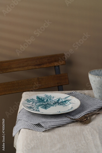 An empty vintage plate on the table (ID: 740061969)