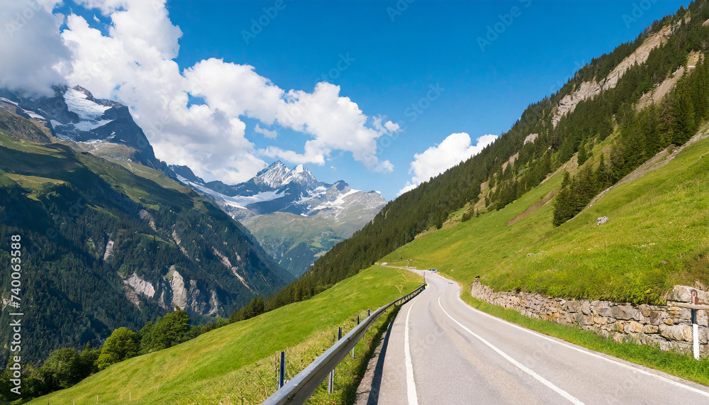 Naklejka premium Road through alpine landscape leading to Klaussen Pass, Switzerland